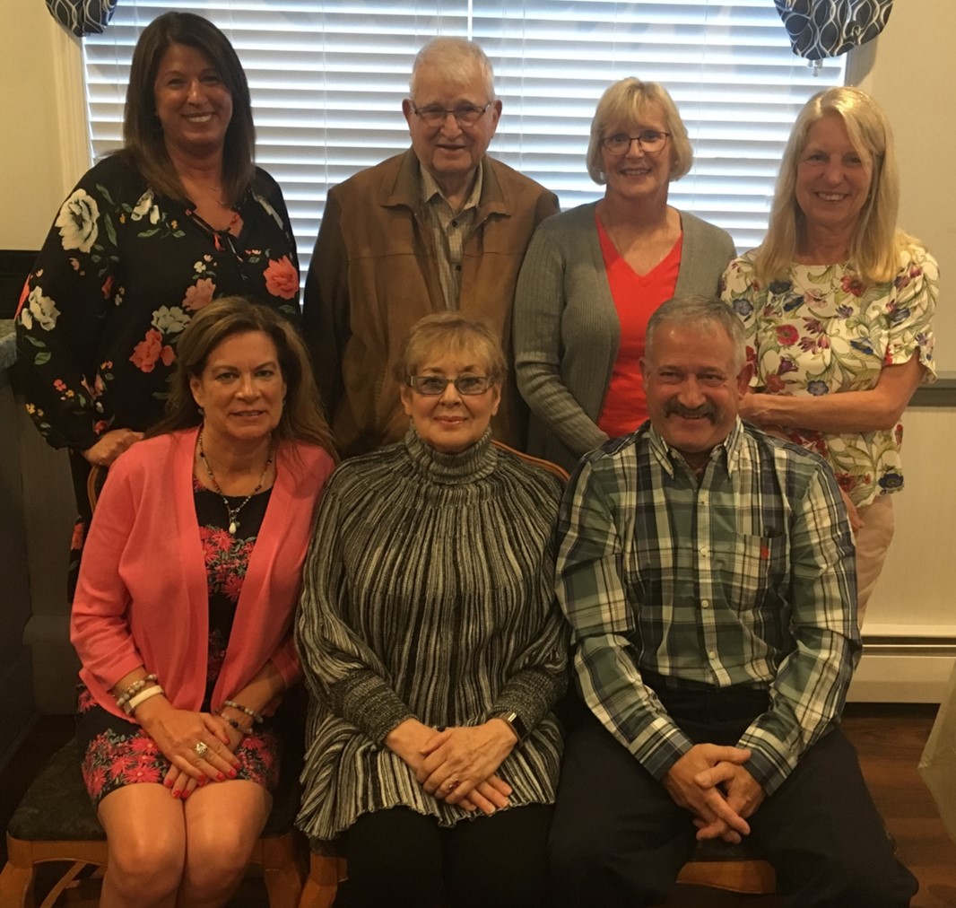 picture of board members at staff appreciation dinner, june 2019.